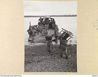 KAIRIRU ISLAND, NEW GUINEA. 1945-09-17. FOLLOWING THE SURRENDER JAPANESE NAVAL PERSONNEL WERE TRANSFERRED FROM KAIRIRU TO MUSCHU ISLAND. APART FROM THEIR PERSONAL GEAR MUCH FURNITURE WAS ..