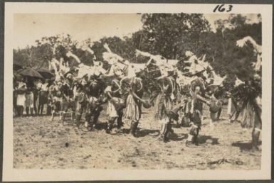 Tolai dancers with tom-toms, Rabaul, Papua New Guinea, probably 1916