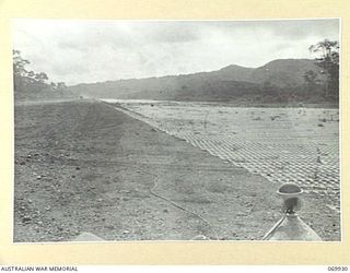 MILNE BAY, NEW GUINEA. 1943-01. TURNBULL FIELD, SO NAMED AS A TRIBUTE TO THE MEMORY OF SQUADRON LEADER PETER TURNBULL, DFC, COMMANDING OFFICER, 76 SQUADRON, ROYAL AUSTRALIAN AIR FORCE, WHO WAS ..