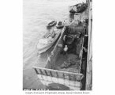 Boats being prepared for shallow water diving in Bikini Atoll lagoon, summer 1947