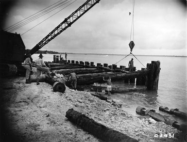 2nd NZEF IP soldiers of A Field Company Bridging Platoon constructing Salipal Pier on Nissan Island, Papua New Guinea