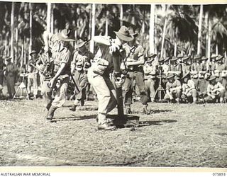 POTSDAM, NEW GUINEA. 1944-09-05. TROOPS OF THE 25TH INFANTRY BATTALION MOUNTING AS MORTAR READY FOR ACTION DURING THEIR COURSE AT THE MORTAR REFRESHER SCHOOL. IDENTIFIED PERSONNEL ARE:- N296776 ..