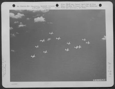 Formation Of Consolidated B-24 "Liberators" Of The Vii Bomber Command Over Kwajalein, Marshall Islands, 3 August 1944. This Is A Practice Formation To Test New Formation Shown By Lt. Colonel Earl R. Task Of Aaf Board, Orlando, Florida. (U.S. Air Force Number A63832AC)