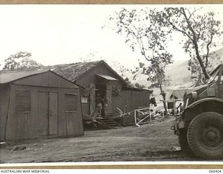 17 MILE, LALOKI RIVER, NEW GUINEA. 1943-11-22. CANTEEN ISSUING POINT FOR THE CORDIAL FACTORY ESTABLISHED AND OPERATED BY THE AUSTRALIAN DEFENCE CANTEEN SERVICES ATTACHED TO HEADQUARTERS, NEW GUINEA ..