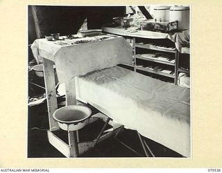 DREGER HARBOUR, NEW GUINEA. 1943-07. OPERATING COUCH AND INSTRUMENTS IN THE THEATRE OF THE 10TH FIELD AMBULANCE