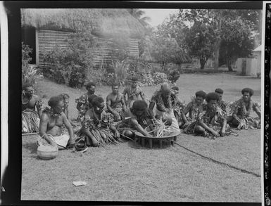 Male performers preparing the kava at the meke, Lautoka, Fiji