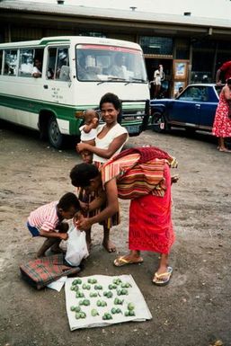 Papua New Guinea: Bus depot, people buying betel nuts