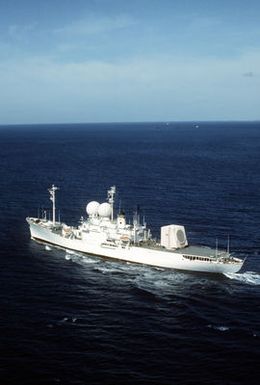 An aerial port quarter view of the missile range instrumentation ship USNS OBSERVATION ISLAND (T-AGM 23) underway off the coast Hawaii