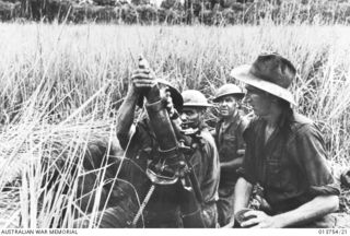 An Australian mortar crew in action during fighting against Japanese forces in the Gona area