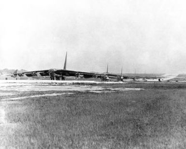A B-52D Stratofortress aircraft, from Strategic Air Command, line up for takeoff as they prepare for strikes over Hanoi and Haiphong, North Vietnam, during Operation LINEBACKER