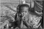 Young girl, Imala, with small tortoise-shell earrings