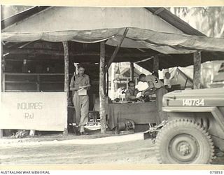 ALEXISHAFEN, NEW GUINEA. 1944-09-13. THE RECEIPT AND ISSUE OFFICE OF THE 133RD BRIGADE WORKSHOPS. IDENTIFIED PERSONNEL ARE:- NX200926 SERGEANT A.S. MORROW (1); N92142 SERGEANT L.J. SOBB (2); ..