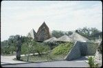 Papua New Guinea National Museum and Art Gallery: entrance with large sculpture and haus tambaran-style facade