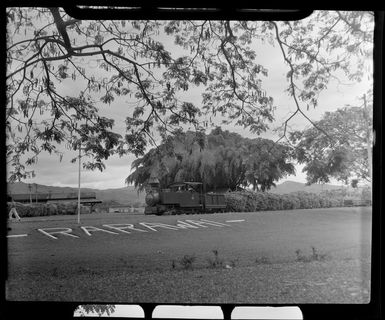 Train loaded with sugar cane pulling into Rarawai, Ba, Fiji