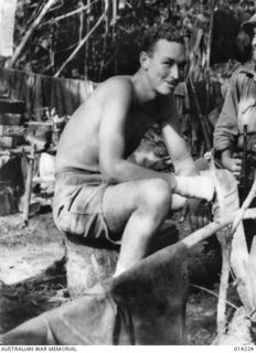 1943-01-26. PAPUA. NEARING THE END OF THE PAPUAN CAMPAIGN AGAINST JAPAN. AFTER FIGHTING IN THE JUNGLE AT SANANANDA LIEUTENANT S. HORDEN OF SYDNEY HAS A REST