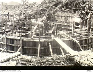 Basilisk Battery, New Guinea. 1944-04-15. A 5.25 inch anti aircraft gun pit being constructed by 8th Army Troops Company, Royal Australian Engineers. This emplacement was part of the Port Moresby ..