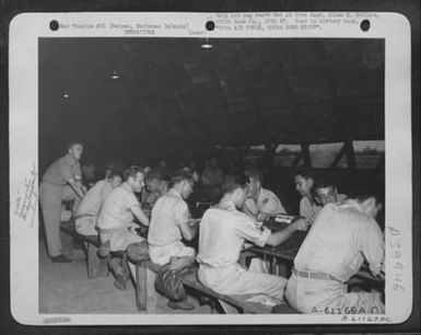 Lt. O'Mahoney'S Processing Mill In Group S-2 Building. All High-Point Enlisted Men Were Cleared From The Group Within 48 Hours After Receipt Of Authority For Their Trasfer. 500Th Bomb Group, Saipan, Marianas Islands. (U.S. Air Force Number A61169AC)