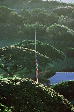 A flag flies at half staff in observance of Memorial Day at the National Memorial Cemetery of the Pacific, also known as the Punchbowl