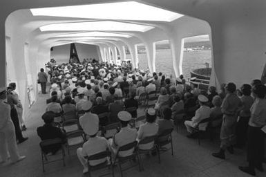 A back view of the guests attending the ceremony aboard the USS ARIZONA Memorial commemorating the 40th anniversary of the Japanese attack on Pearl Harbor