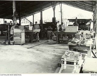 PORT MORESBY, NEW GUINEA. 1944-04-10. THE CARPENTER'S SHOP AT THE 11TH ADVANCED WORKSHOP, AUSTRALIAN ELECTRICAL AND MECHANICAL ENGINEERS