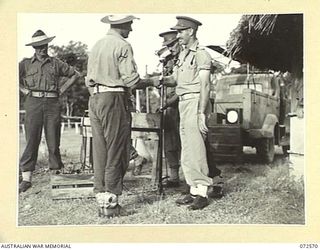 PORT MORESBY, NEW GUINEA. 1944-04-23. QX6209 CAPTAIN D.E. PATTERSON, CO, (1), PRESENTING PRIZES TO THE WINNING COMPETITORS AT THE COMPLETION OF THE 2/101ST GENERAL TRANSPORT COMPANY SPORTS MEETING ..