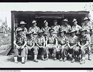 LAE, NEW GUINEA. 1944-06-11. GROUP PORTRAIT OF MEMBERS OF HEADQUARTERS, 1ST PIGEON SECTION. LEFT TO RIGHT: FRONT ROW: QX47780 SIGNALMAN R. TURBETT; WX39307 CORPORAL A. C. GRAY; QX51159 LANCE ..