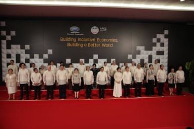 Barack Obama joins Asia Pacific Economic Cooperation Summit leaders and spouses for a group photo in Pasay, Metro Manila, Philippines, November 18, 2015