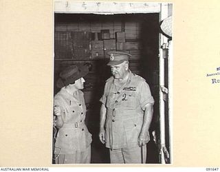 LAE, NEW GUINEA. 1945-05-11. GENERAL SIR THOMAS A. BLAMEY, COMMANDER-IN-CHIEF, ALLIED LAND FORCES, SOUTH WEST PACIFIC AREA (2), ACCOMPANIED BY LIEUTENANT COLONEL M.J. SPENCER, ASSISTANT CONTROLLER ..