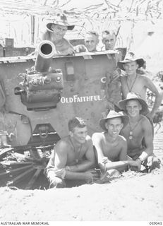 RAMU VALLEY, NEW GUINEA. 1943-10-23. CREW OF "OLD FAITHFUL", A 25-POUNDER GUN OF "F" TROOP, 54TH BATTERY, 2/4TH AUSTRALIAN FIELD REGIMENT. SHOWN: VX47511 GUNNER (GNR) E. A. GRAY (1); VX123662 GNR ..