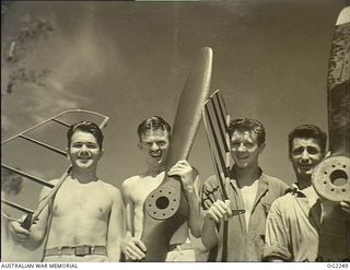 TOROKINA, BOUGAINVILLE ISLAND, SOLOMON ISLANDS. C. 1945-02. FOUR VICTORIANS SERVING WITH THE RAAF. LEFT TO RIGHT: 42382 LEADING AIRCRAFTMAN (LAC) J. J. STAPLETON, HAMILTON, VIC; 56165 LAC P. H. ..