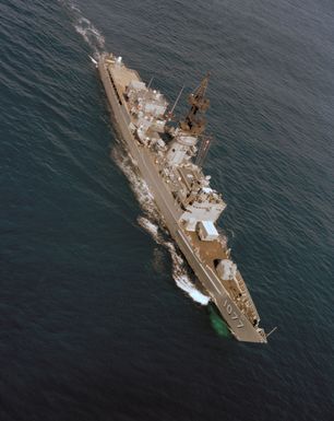 An elevated starboard bow view of the frigate USS OUELLET (FF 1077) underway