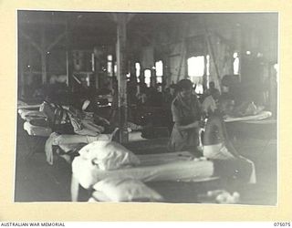 SOUTH ALEXISHAFEN, NEW GUINEA. 1944-08-08. THE INTERIOR OF NO.4 SURGICAL WARD, 111TH CASUALTY CLEARING STATION