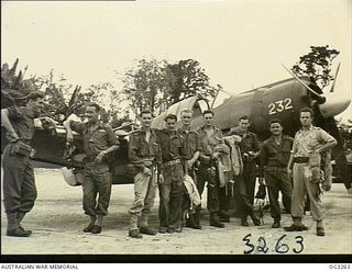 TOROKINA, BOUGAINVILLE ISLAND, SOLOMON ISLANDS. 1945-08-16. MEMBERS OF NO. 5 (TACTICAL RECONNAISSANCE) SQUADRON RAAF WHO DROPPED LEAFLETS GIVING INSTRUCTIONS TO JAPANESE FORCES TELLING THEM HOW AND ..