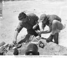 Scientists preparing fish organs for examination, Bikini Atoll, 1947