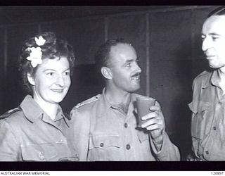 RABAUL, NEW BRITAIN. 1945-12-28. THE PRIME MINISTER OF AUSTRALIA, MR BEN CHIFLEY, ARRIVED BY PLANE TO VISIT MANY OF THE UNITS IN THE AREA. SOME OF THE GUESTS AT THE SISTERS' MESS AT 118TH ..