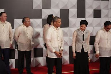 Barack Obama joins Asia Pacific Economic Cooperation Summit leaders and spouses for a group photo in Pasay, Metro Manila, Philippines, November 18, 2015