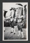 Two men dressed in costume for parade, Papua New Guinea, c1945 to 1952?