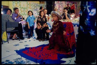 Cook Island haircutting ceremony, Atiu Hall, Mangere, Auckland. Kayne Lucas Upokokeu dances after his haircut