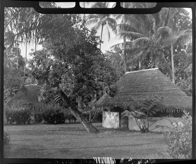 Royal Tahitian Hotel, Tahiti, showing huts and palm trees