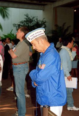 US Navy (retired) PETTY Officer 3rd Class (PO3) Glen C. Hoytt, observes a moment of silence during the Pearl Harbor Commemoration at the USS ARIZONA Memorial Visitor Center, Pearl Harbor, HI. Mr. Hoytt one of the survivors of the Pearl Harbor attack served on the USS SAINT LOUIS