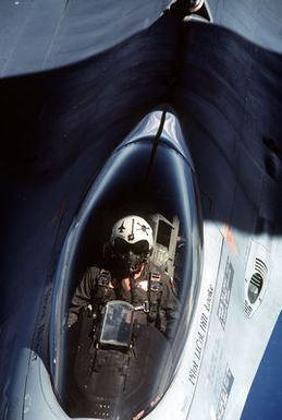 An overhead view of the cockpit of an F-16 Fighting Falcon aircraft as seen from a KC-135 Stratotanker aircraft, preparing to provide in-flight refueling. The Fighting Falcon, from the 428th Tactical Fighter Squadron, is en route to Hawaii to participate in Exercise Cope Elite