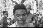 Gunts: young man with feathers in his hair
