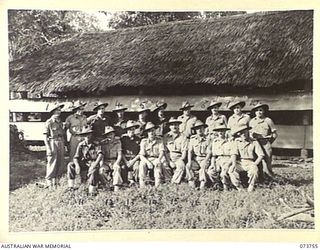 LAE, NEW GUINEA. 1944-06-07. MEMBERS OF THE AUSTRALIAN ELECTRICAL AND MECHANICAL ENGINEERS AT HEADQUARTERS NEW GUINEA FORCE. IDENTIFIED PERSONNEL ARE:- SX4298 CORPORAL M E COX (1); QX26020 CORPORAL ..