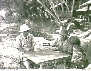 THE SOLOMON ISLANDS, 1945-10-13. JAPANESE OFFICER UNDER INTERROGATION AT KANDAS ISLAND INTERNMENT CAMP. (RNZAF OFFICIAL PHOTOGRAPH.)