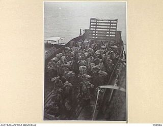 MUSCHU ISLAND, NEW GUINEA. 1945-11-26. ELEVEN HUNDRED JAPANESE TROOPS OF 18 JAPANESE ARMY LEFT THE WEWAK AREA ON THE JAPANESE CRUISER KASHIMA TO RETURN TO JAPAN. THEY ARE THE FIRST JAPANESE TROOPS ..
