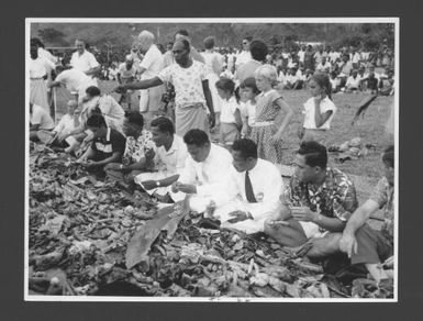 Delegates from Pacific Territories to the Fourth South Pacific Conference held at Rabaul, New Britain [1959], attending a feast in the traditional native manner