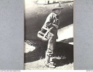 KAIAPIT, NEW GUINEA. 1943-09-25. NX148 BRIGADIER I.N. DOUGHERTY DSO, BRIGADE COMMANDER, 21ST AUSTRALIAN INFANTRY BRIGADE, READY TO BOARD AN OBSERVATION AIRCRAFT