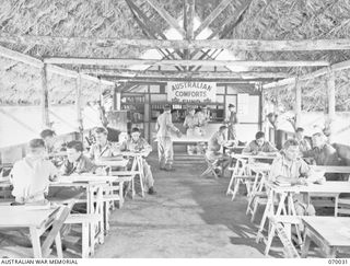 PORT MORESBY, NEW GUINEA. 1944-01-22. AN INTERIOR VIEW OF THE RECREATION HUT BUILT BY THE 2/101ST GENERAL TRANSPORT COMPANY IN THEIR CAMP AREA AND FURNISHED AND SUPPLIED WITH GAMES BY THE ..