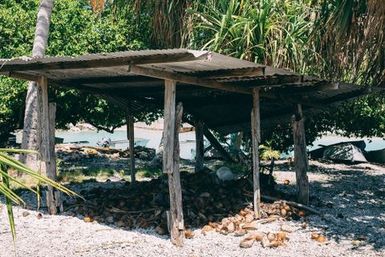 Rooftop over coconut husks, Atafu, Tokelau