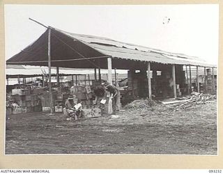 WEWAK AREA, NEW GUINEA, 1945-06-16. A GENERAL VIEW OF THE FIELD MAINTENANCE CENTRE, (ASSISTANT DIRECTOR OF ORDNANCE SERVICE DUMP), HQ 6 DIVISION